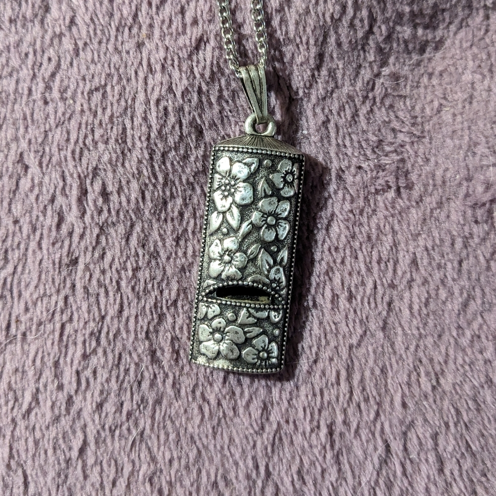 Vintage AVON Floral Embossed Whistle Pendant